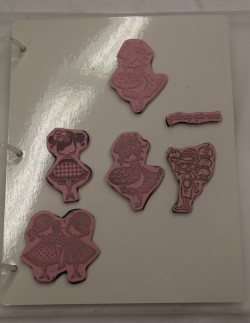 a sample of "dirty" "LOOOOVED" stamps on a storage panel with thin EZ MOUNT