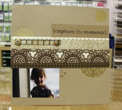 I love mixing papers.. used Jillibean soup, Basic Grey Nook and Pantry and Bella Boulevard.. Tim Holts mini film strip ribbon (LOVE IT) and Nook and pantry stitched brads.  Also used Hambly GOLD rubons and of course, the PIECE de RESISTANCE, our CAPTURE THE MOMENTS stamp :)