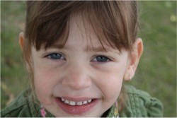 the closeup of the girl with the messy face (before the party)