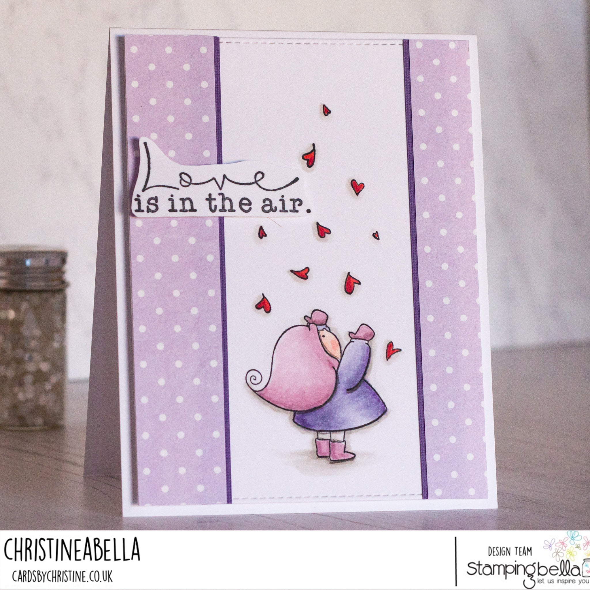  www.stampingbella.com: rubber stamp used: Bundle Girl with falling heartsl. Card by Christine Levison