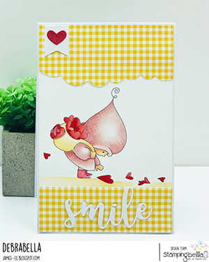  www.stampingbella.com: rubber stamp used BUNDLE GIRL WITH A HEART TRAIL. card by Debra James