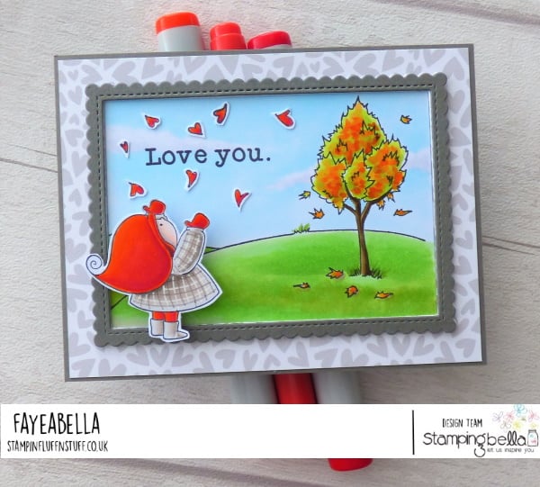 www.stampingbella.com: rubber stamp used: BUNDLE GIRL WITH FALLING HEARTS and FALL BACKDROP card by Faye Wynn Jones