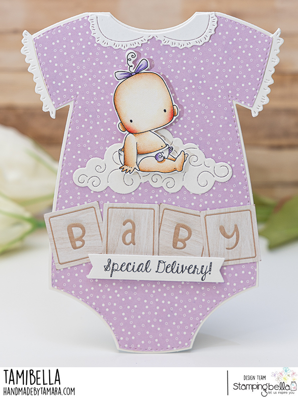 Handmade baby card by Tamara featuring Stamping Bella Baby Boy & Girl and Baby Sentiment Set cling mounted rubber stamp sets. The card is shaped like a purple polka dot onesie with white lace trim, showcasing a baby sitting on a cloud. The word 'BABY' is spelled out with wooden block letters, and a banner reads 'Special Delivery!'