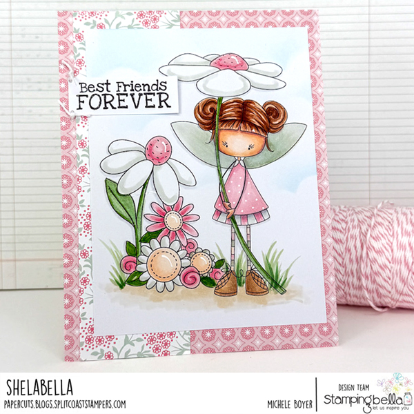 Handmade card design featuring Stamping Bella Whimsabella DaisyDream, Spec-Tacular Together Sentiment Set, and Spring Backdrop cling mounted rubber stamps. The card showcases a whimsical fairy girl holding a large daisy, surrounded by various flowers. The sentiment 'Best Friends FOREVER' is prominently displayed on the top left. The card is bordered with a pink floral pattern and has a delicate, pastel color scheme. The design is by Michele Boyer as part of the Stamping Bella design team.